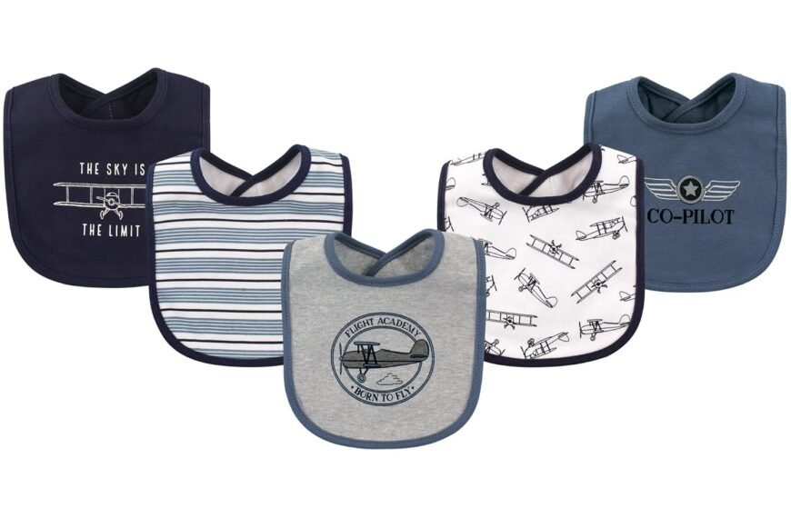 Hudson Baby Unisex Baby Cotton Bibs, Aviation, One Size—set of 5 with aviation designs like airplanes and stripes plus phrases such as "The sky is the limit" and "Co-Pilot" in blue and gray tones.