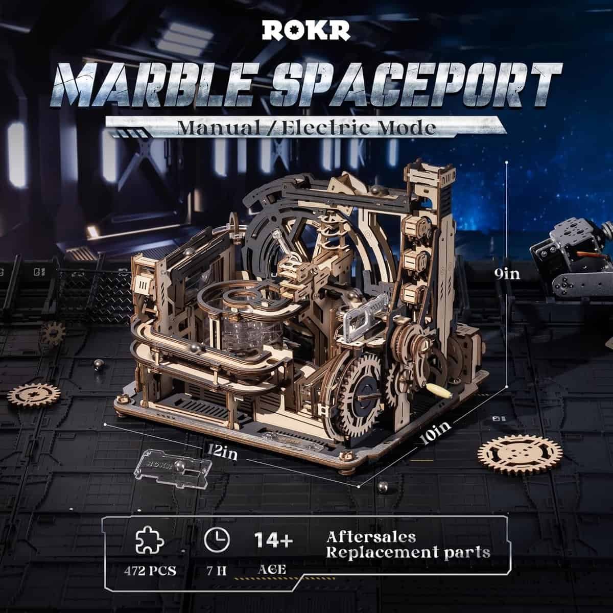 ROKR Marble Spaceport wooden model kit, shown assembled with dimensions (12in x 10in x 9in), 472 pieces, for ages 14+, with manual/electric modes and replacement parts listed.