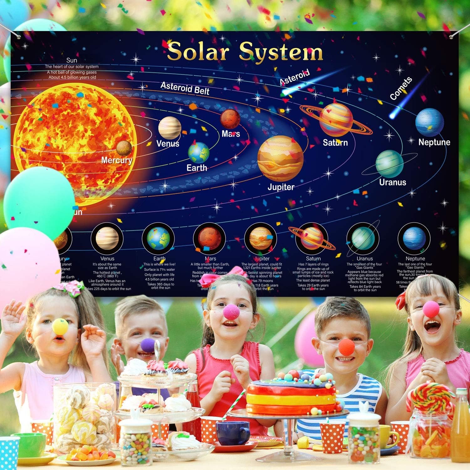 Children with clown noses celebrate at a party with cakes and balloons, with a colorful solar system diagram poster displayed behind them.
