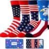 Four pairs of socks with American flag and bald eagle designs are displayed above a blue HappyPop gift box.