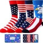 Four pairs of socks with American flag and bald eagle designs are displayed above a blue HappyPop gift box.