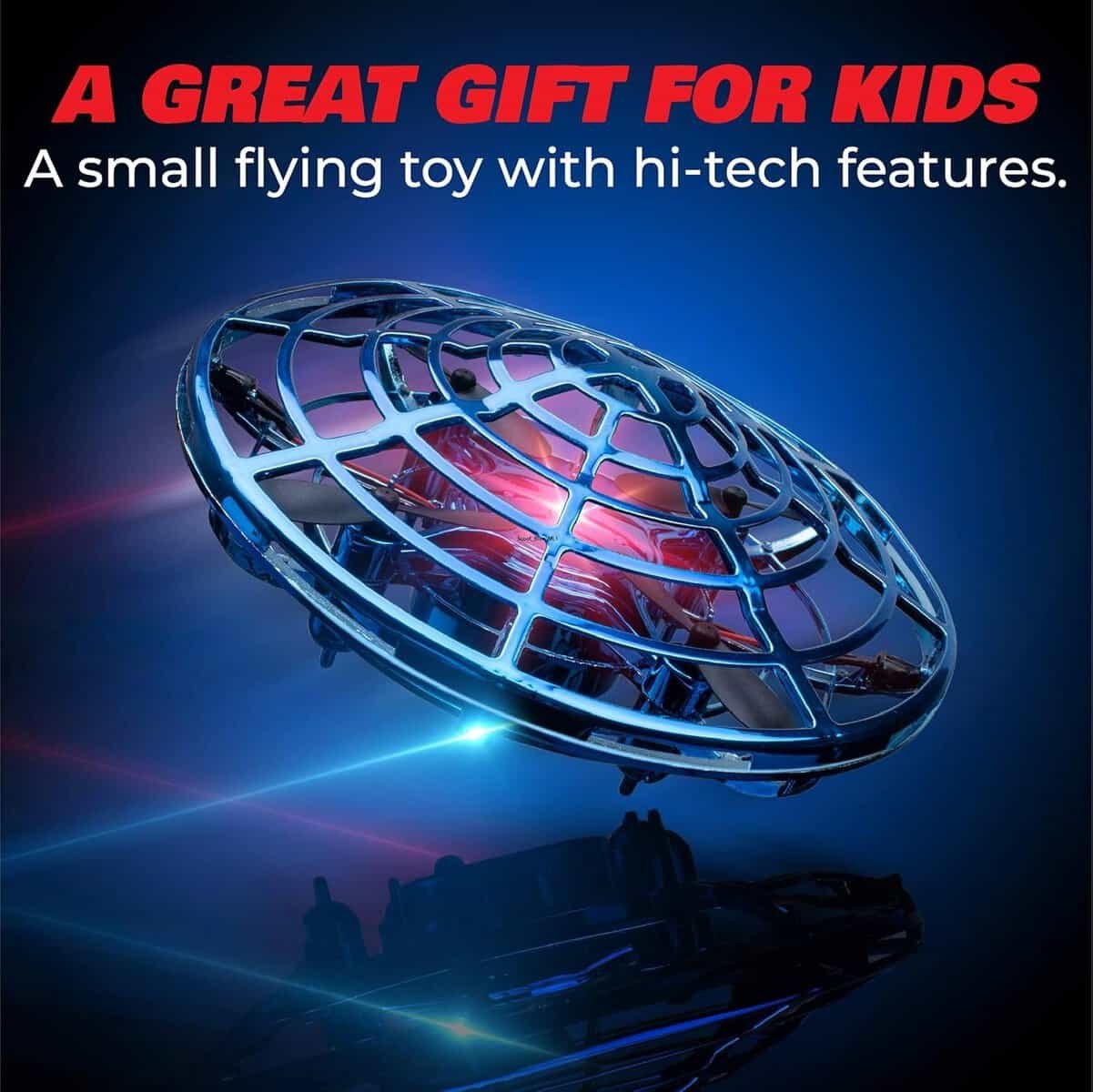A small, round flying toy with a metallic cage design and glowing red light, shown against a dark blue background. Text highlights it as a great gift for kids with hi-tech features.