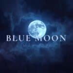A full Blue Moon glows in a dark, cloudy night sky with the text "BLUE MOON MAY 2026" overlaid in large, pale letters.