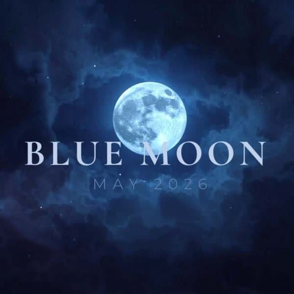 A full Blue Moon glows in a dark, cloudy night sky with the text "BLUE MOON MAY 2026" overlaid in large, pale letters.