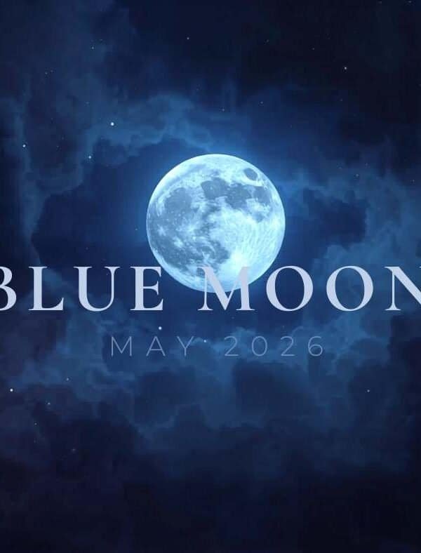 A full Blue Moon glows in a dark, cloudy night sky with the text "BLUE MOON MAY 2026" overlaid in large, pale letters.
