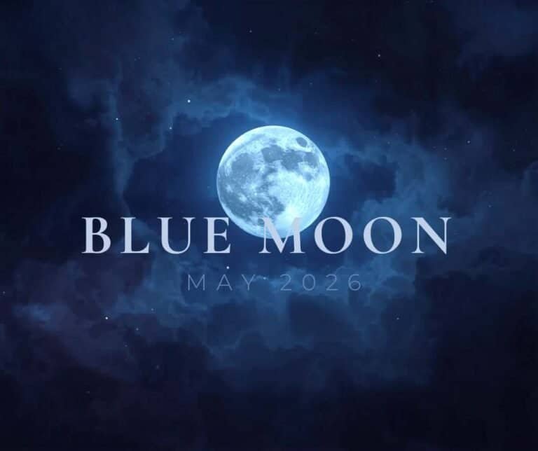 A full Blue Moon glows in a dark, cloudy night sky with the text "BLUE MOON MAY 2026" overlaid in large, pale letters.