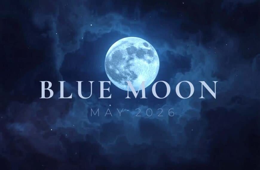 A full Blue Moon glows in a dark, cloudy night sky with the text "BLUE MOON MAY 2026" overlaid in large, pale letters.
