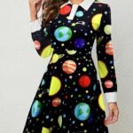 Woman wearing a dress with an auto-draft space-themed pattern.