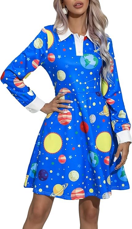 Woman wearing a fashion-forward blue dress with an astronomy-inspired print, featuring planets and stars.