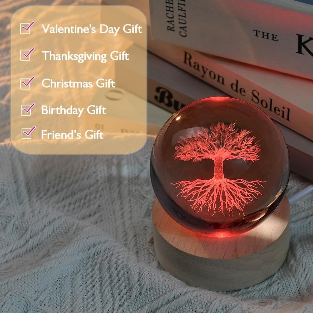 A glowing crystal ball with a tree design sits on a wooden base. Nearby, a list suggests it as a gift for Valentine's Day, Thanksgiving, Christmas, birthdays, and friends.