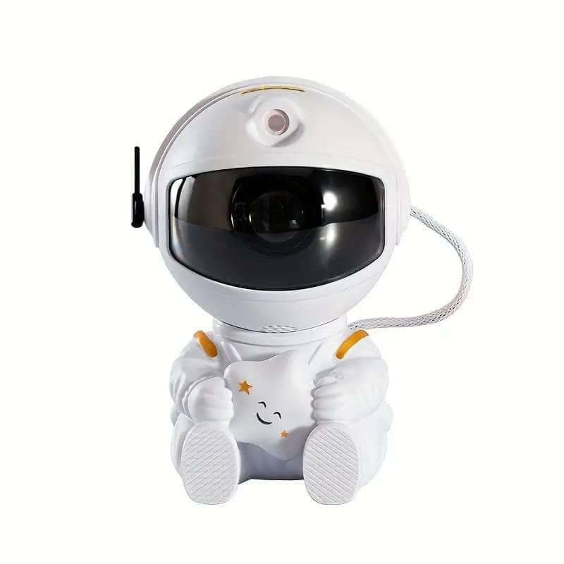 The "Your World with the Astronaut Galaxy Projector" features a small astronaut figurine adorned with a smiling star on its suit, resembling a guardian of the cosmos. Its large visor suggests it is poised to project the mysteries of the galaxy from its celestial stand.