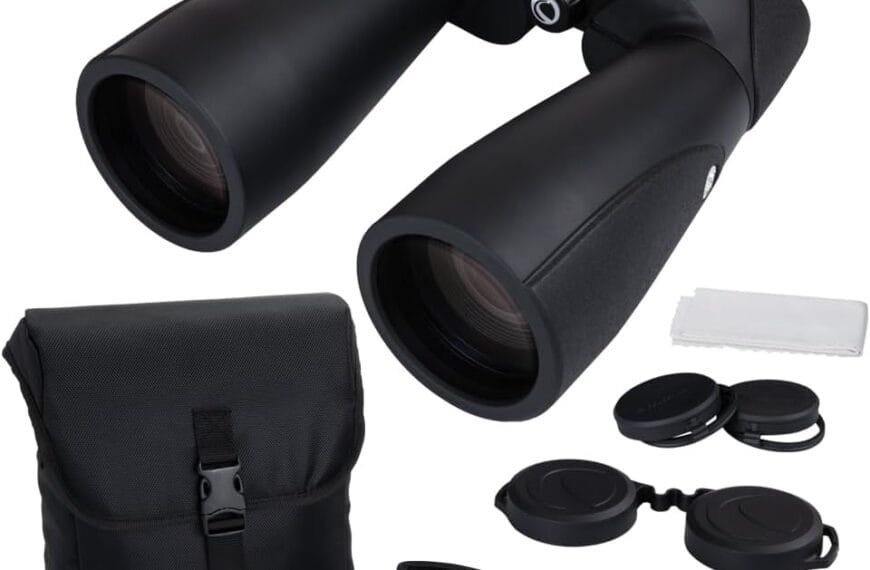 Black Celestron binoculars with lens caps, a cleaning cloth, bag, and branded strap, set against a white background.