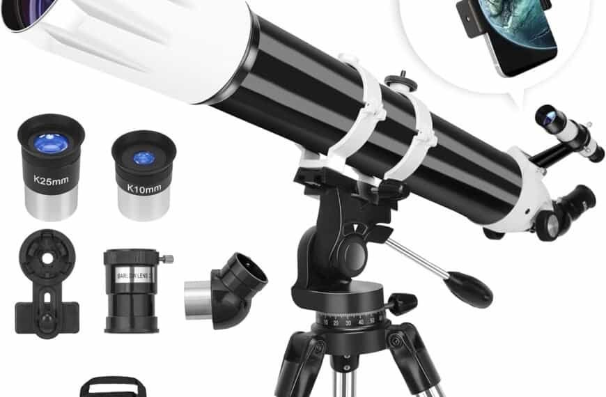 Black and white telescope with lenses, a mount, smartphone adapter, and carrying case displayed on a tripod.