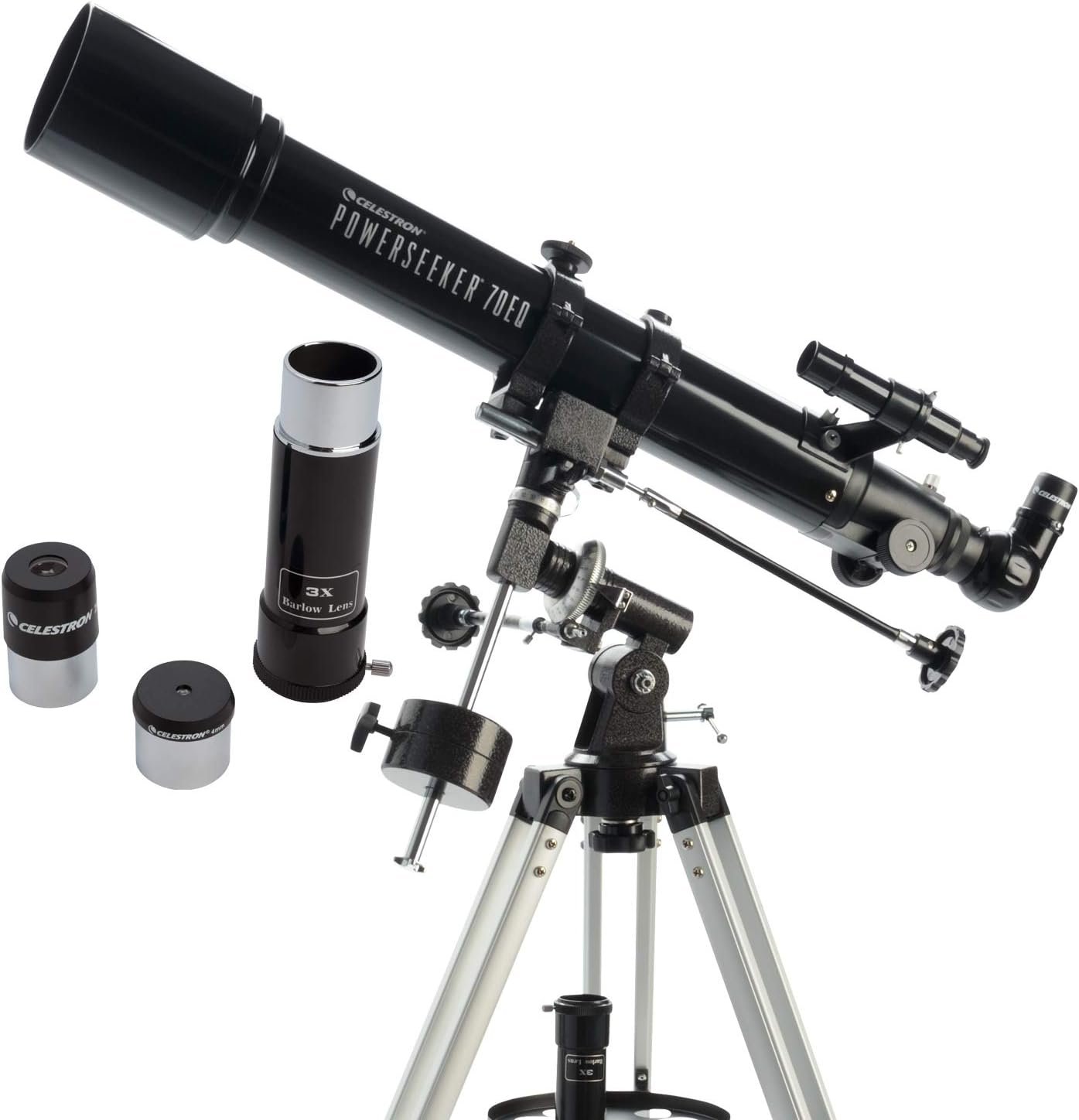 A black Celestron PowerSeeker 70EQ telescope mounted on a tripod, with two eyepieces and a 3x Barlow lens displayed beside it.