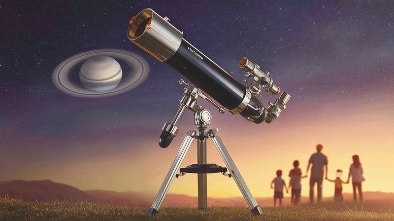 A telescope is set up outdoors at dusk, pointing towards a large, visible Saturn in the sky. A family of four stands in the background, observing the scene.