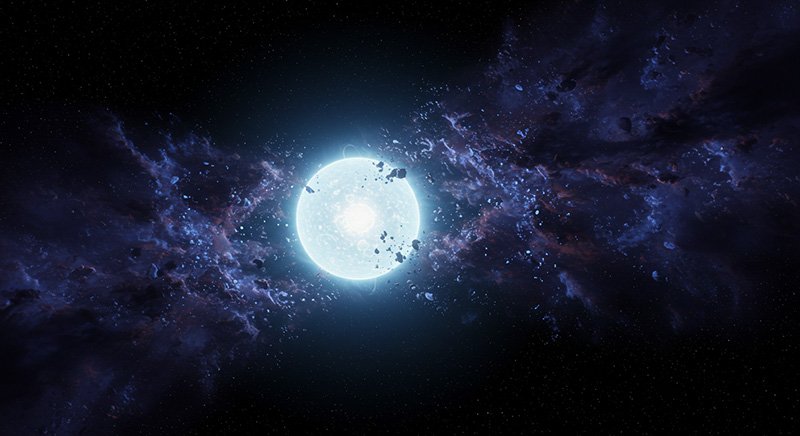 What Is Hidden In The Core Of A Neutron Star? 1 A bright blue-white star emits light and energy in space, surrounded by cosmic dust and debris against a dark, star-speckled background.