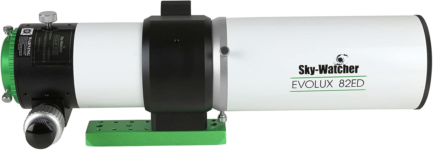 A white Sky-Watcher Evolux 82ED telescope with black and green accents, shown from the side against a plain background.