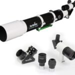 A black and white Sky-Watcher EVOSTAR 120ED telescope with two eyepieces, a diagonal, and a finderscope displayed separately.