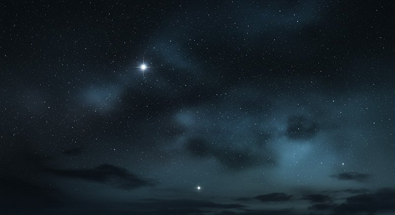 A night sky filled with stars and scattered clouds, featuring two bright stars standing out among smaller, dimmer ones.