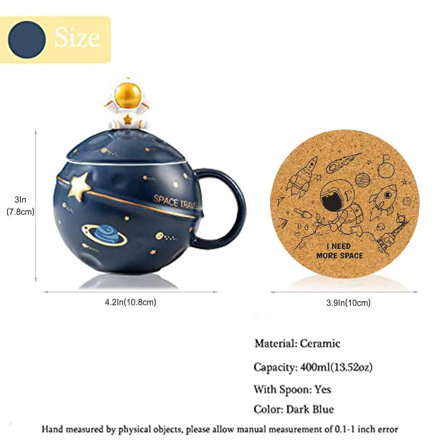 Dark blue ceramic mug with a space theme, matching spoon, and a round cork coaster featuring astronaut and space illustrations. Mug capacity is 400ml (13.52oz).