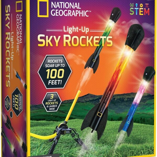 National Geographic Light-Up Sky Rockets STEM kit box showing three colorful rockets launching from a grassy field, with text stating rockets soar up to 100 feet and includes launch base.