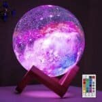 The BRIGHTWORLD Moon Lamp Galaxy Lamp 5.9 inch features 16 LED colors with remote & touch control, making it a magical 3D night light gift for girls, boys, kids, or women’s birthdays.