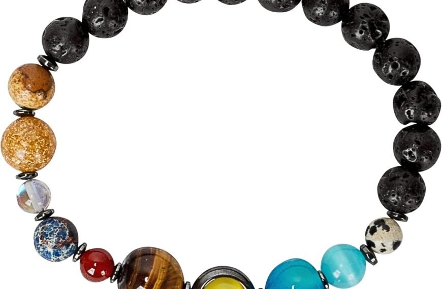 A beaded bracelet featuring black lava beads and several colorful accent beads in various sizes and finishes.