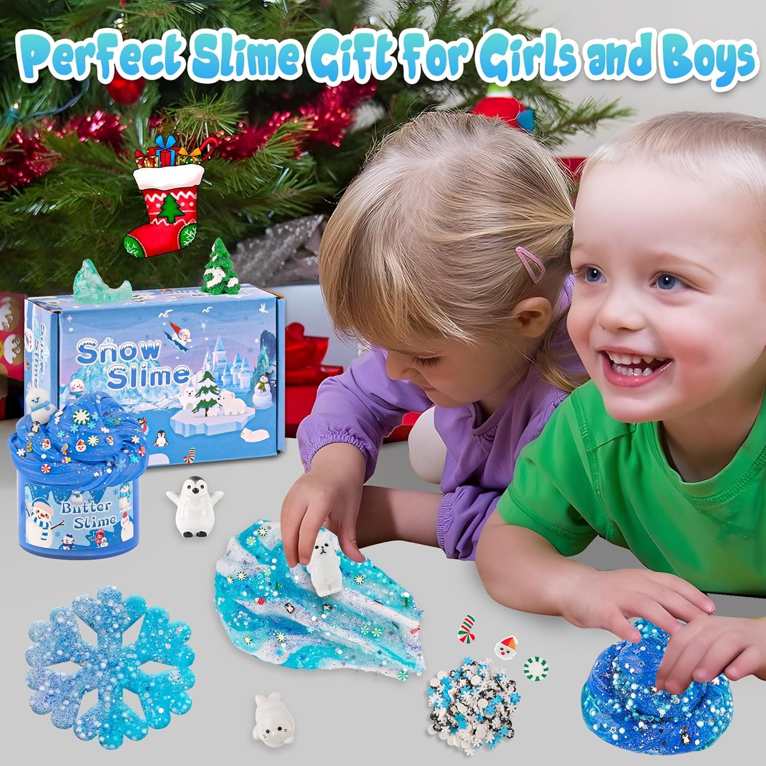 Two young children play with blue and white snow-themed slime kits in front of a decorated Christmas tree. Text above reads, "Perfect Slime Gift for Girls and Boys.