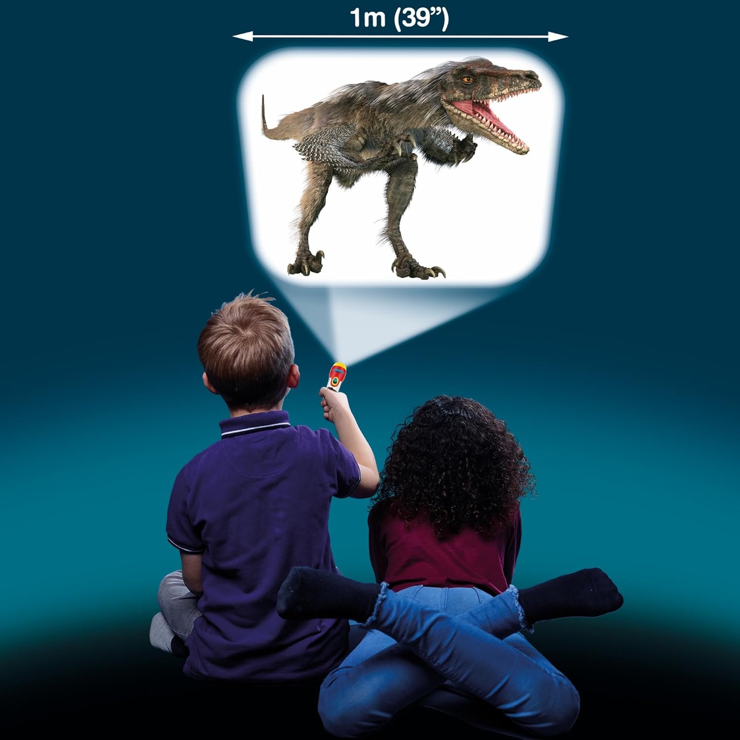 Two children sitting on the floor use a handheld projector to display a large image of a dinosaur on the wall, with a 1 meter (39 inches) width measurement shown above the projection.