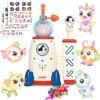 Children’s toy set with a white rocket ship, colorful winged animal figures, stickers, and small multicolored beads displayed on a white background.