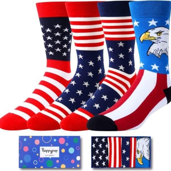 Four pairs of socks with American flag and bald eagle designs are displayed above a blue HappyPop gift box.